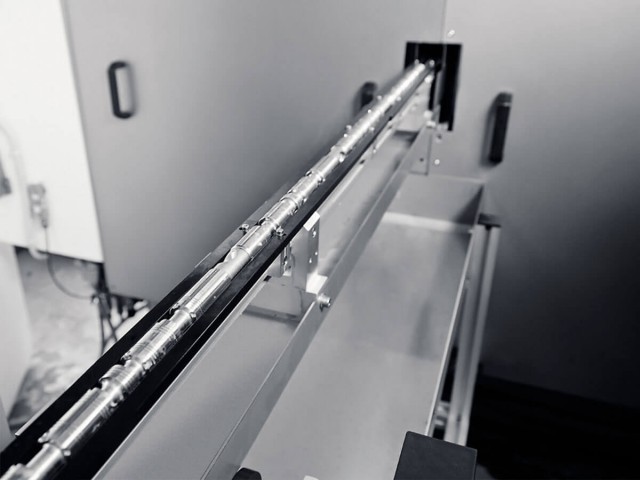 Through-Feed Grinding- CNC controlled grinding/regulating wheel enhances process capability